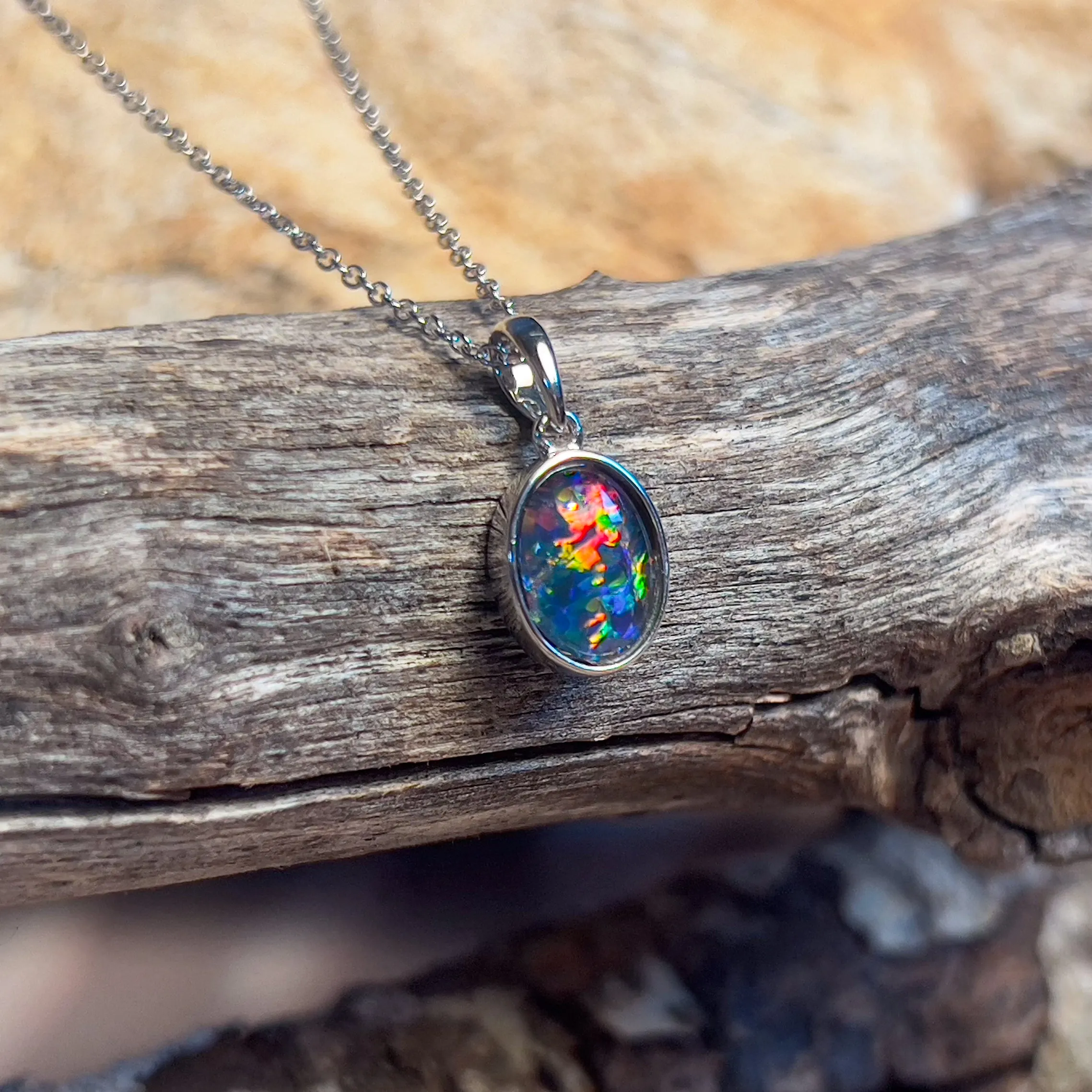 9kt White Gold 9x7mm Opal triplet bezel set pendant