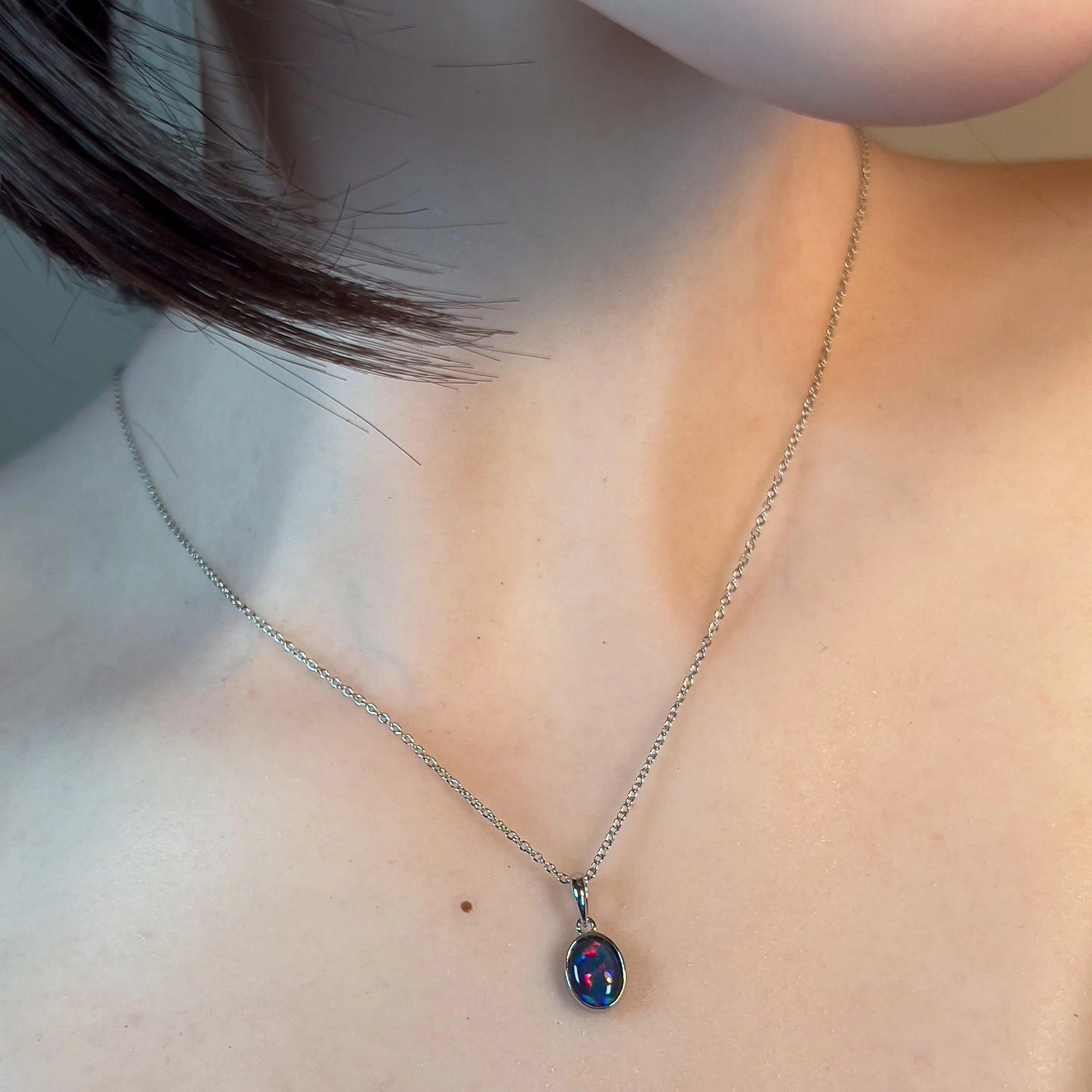 9kt White Gold 9x7mm Opal triplet bezel set pendant