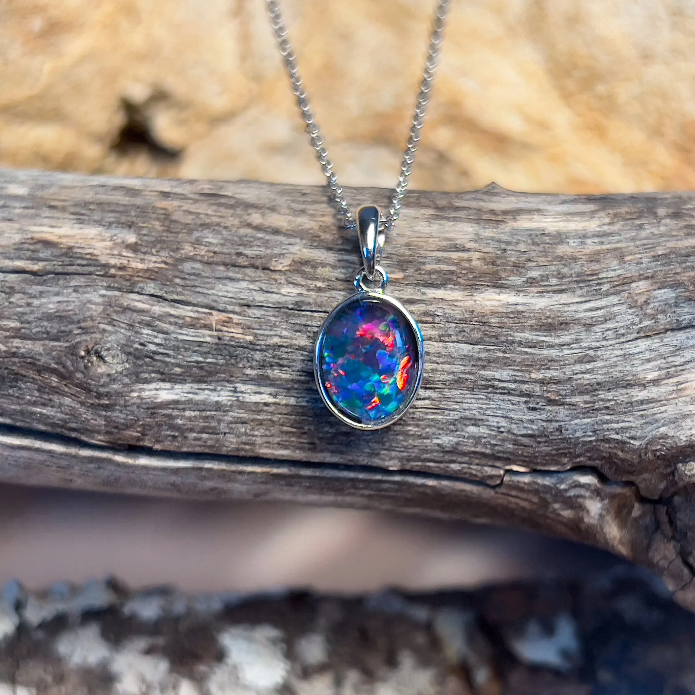 9kt White Gold 9x7mm Opal triplet bezel set pendant