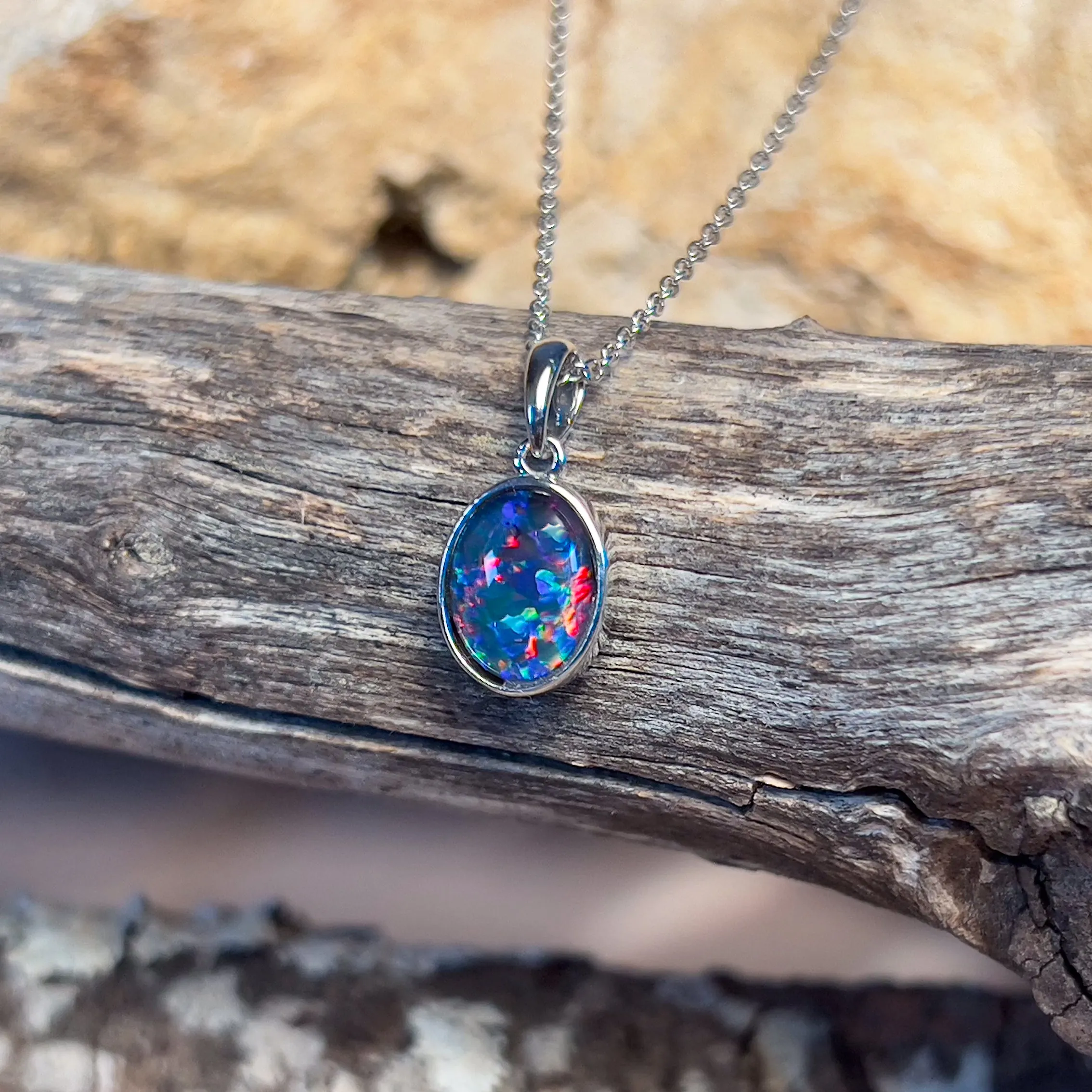 9kt White Gold 9x7mm Opal triplet bezel set pendant