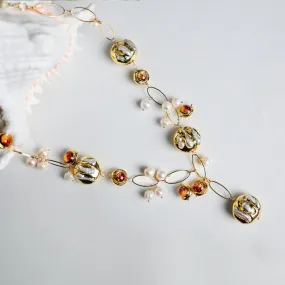 Natural Keshi pearl charm necklace